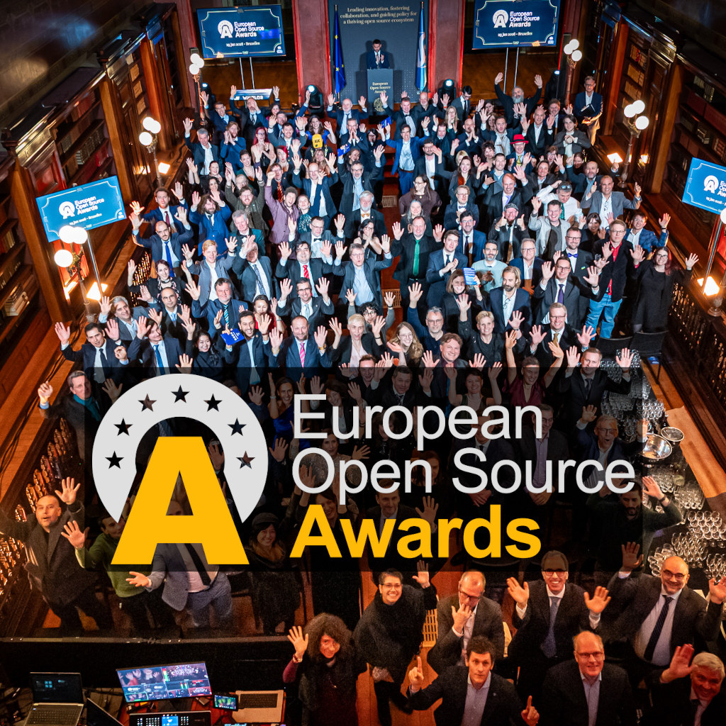 Photo of a crowd of people at the European Open Source Awards (EOSA) gala 2026, smiling into the camera and raising their hands for a friendly wave. The photo is overlaid with the EOSA logo.